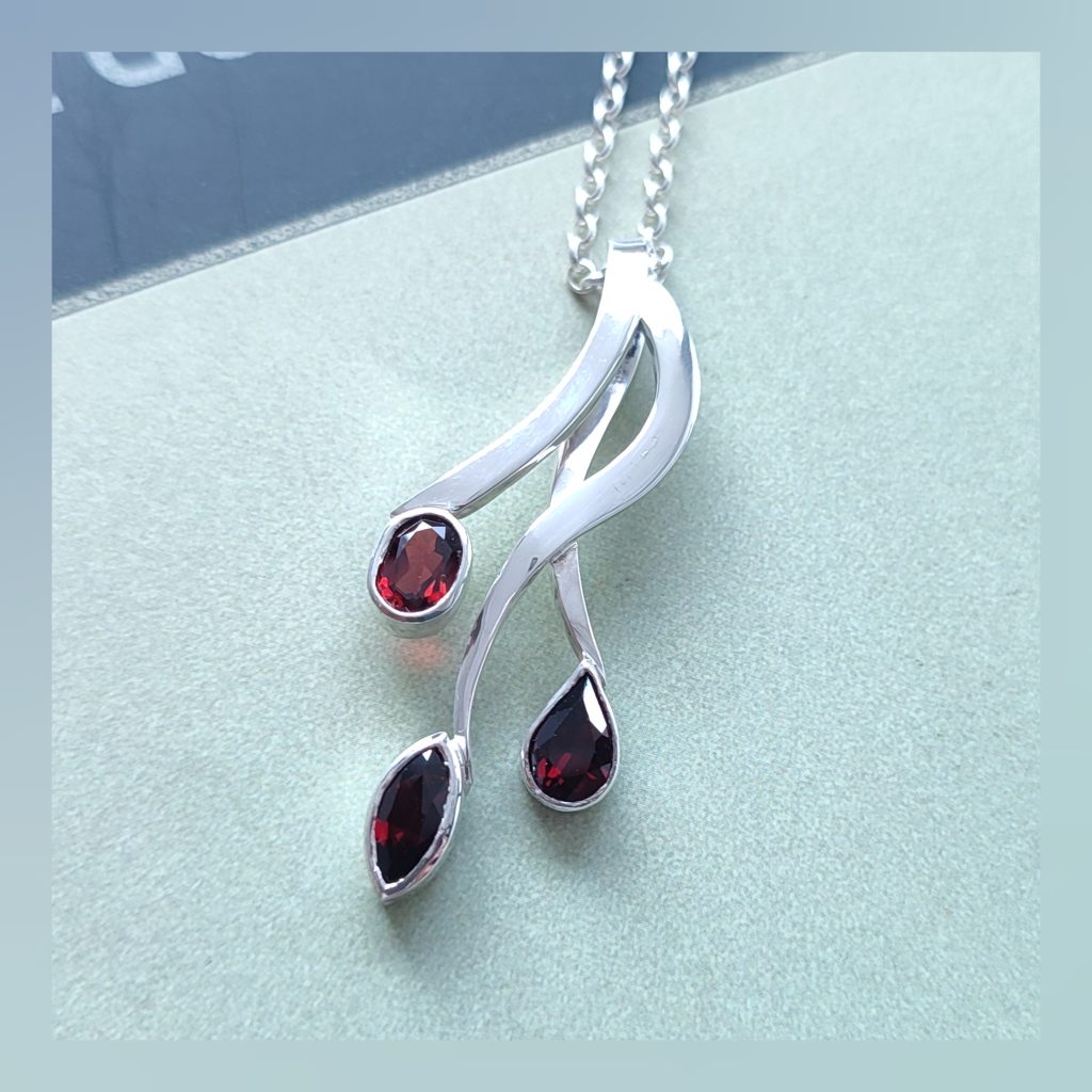 Garnet drops set in Sterling Silver